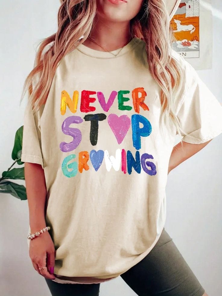 Never stop growing women's oversized tshirt